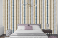 Calming coastal stripe wallpaper creating a serene accent wall in a cozy modern bedroom