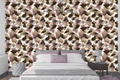 Warm taupe and mauve abstract painted wallpaper creating a cozy accent wall in a modern bedroom