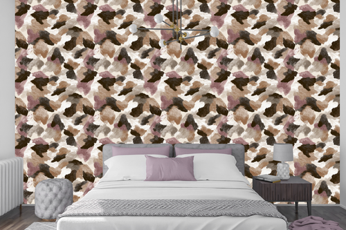 Warm taupe and mauve abstract painted wallpaper creating a cozy accent wall in a modern bedroom