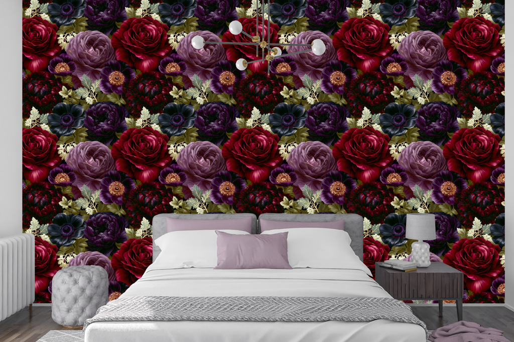 Dark gothic rose and anemone wallpaper styled as a dramatic bedroom feature wall with deep velvet headboard, brass candlelight, and jewel-toned accessories — peel and stick or traditional paste moody floral wallpaper by WallpaperPixi