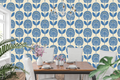 Mid-century modern slate blue and cream geometric floral wallpaper in a stylish dining room setting