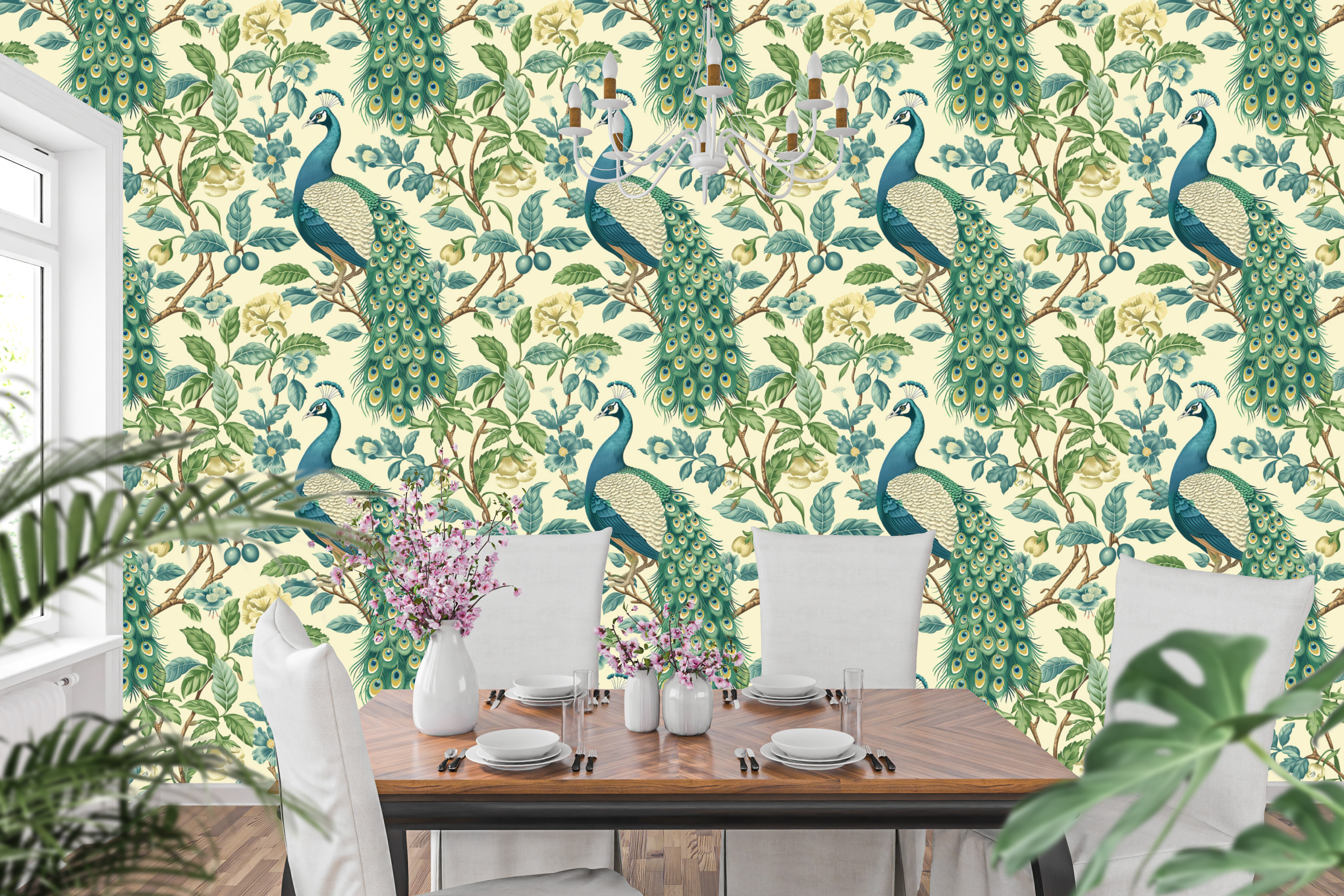 Chinoiserie peacock wallpaper featuring magnificent peacock birds with detailed emerald and sapphire plumage, cascading golden-eyed tail feathers, blue and ivory botanical blossoms, trailing branches, and rich green foliage on a warm ivory ground — premium heritage bird wallpaper by WallpaperPixi