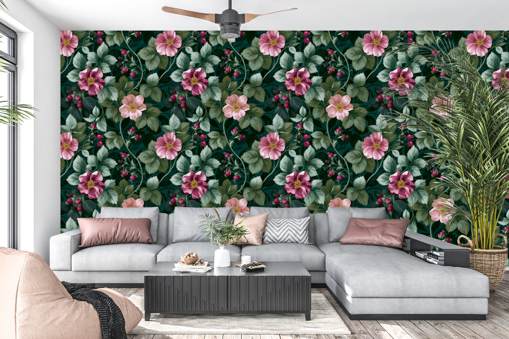 Dark teal wild rose wallpaper styled as an atmospheric bedroom feature wall with velvet headboard, brass lighting, and warm linen bedding — peel and stick or traditional paste vintage wallpaper by WallpaperPixi