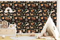 Woodland animals wallpaper with fox, bear, deer, rabbit, raccoon, hedgehog, and forest foliage on a dark background