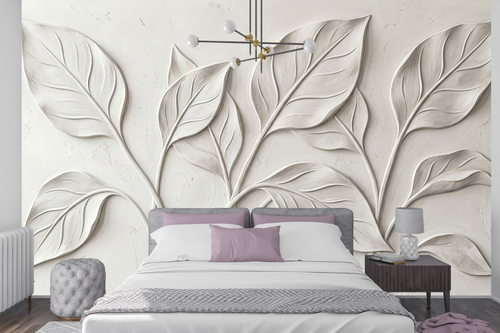 Faux sculpted botanical peel and stick wallpaper behind a modern luxurious bed