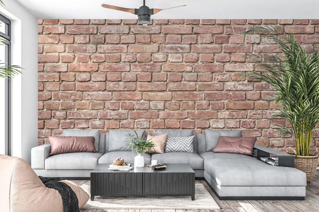Authentic weathered red brick mural in an industrial loft living room