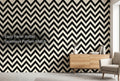 Black and white herringbone tile peel and stick wallpaper in a modern living room