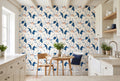 Blue and white floral wallpaper with oversized white flowers and cobalt blue leaves