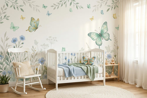 
Butterfly garden daisy meadow wall mural accent wall in a bright nursery with a white crib and soft sage and blue bedding