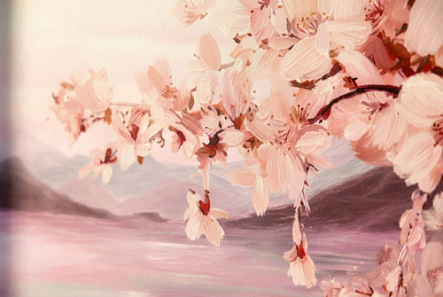 Close-up detail of cherry blossom mountain lake wallpaper mural showing sakura petals misty mountains and soft reflective water