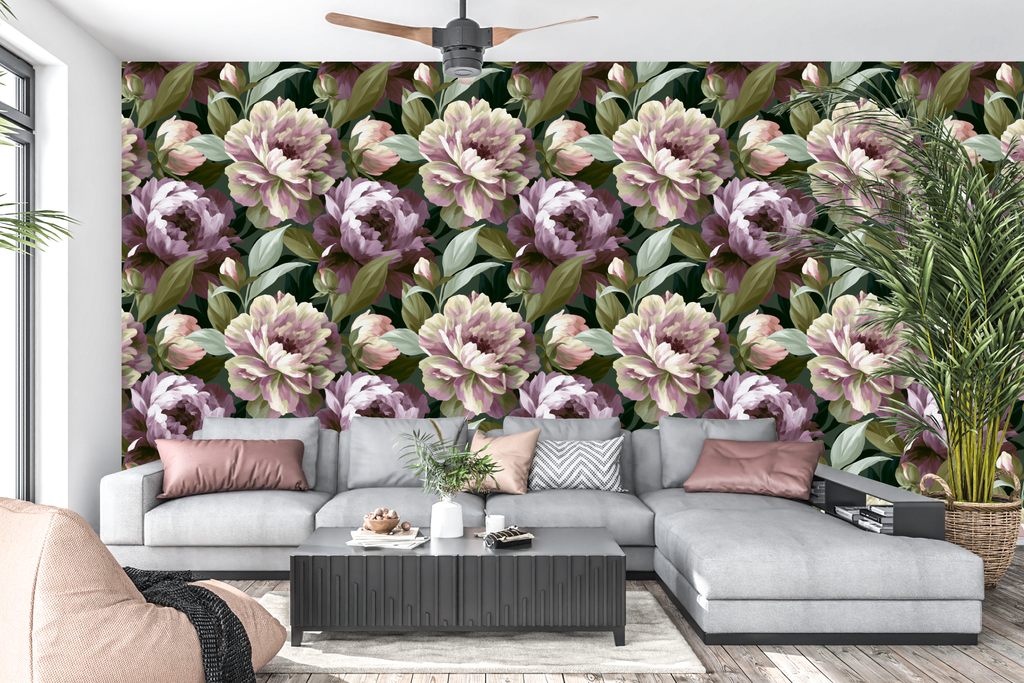 Large scale romantic purple and blush floral peel and stick wall mural behind a luxurious living room sofa