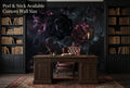 Dark floral gothic wallpaper mural in a moody dark academia library study with black bookshelves and candlelight