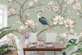 Elegant Chinoiserie bird and magnolia wall mural in a traditional dining room