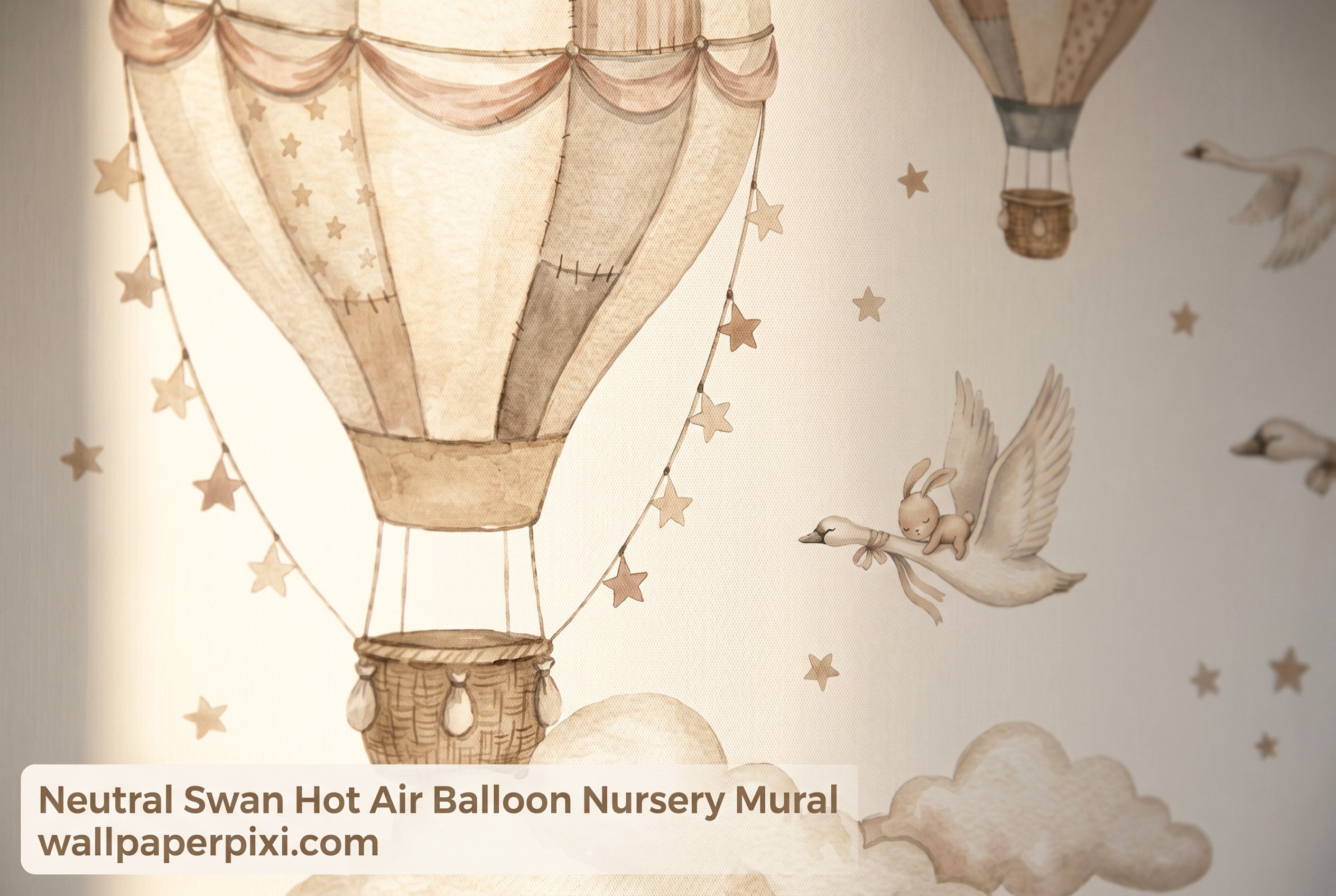 Close-up detail of neutral swan hot air balloon nursery wallpaper mural showing watercolour balloon patchwork detail bunny on swan back and beige stars