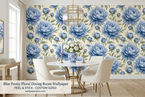 Blue watercolour peony floral wallpaper in a bright elegant dining room with a white round table blue and white china and brass candleholders