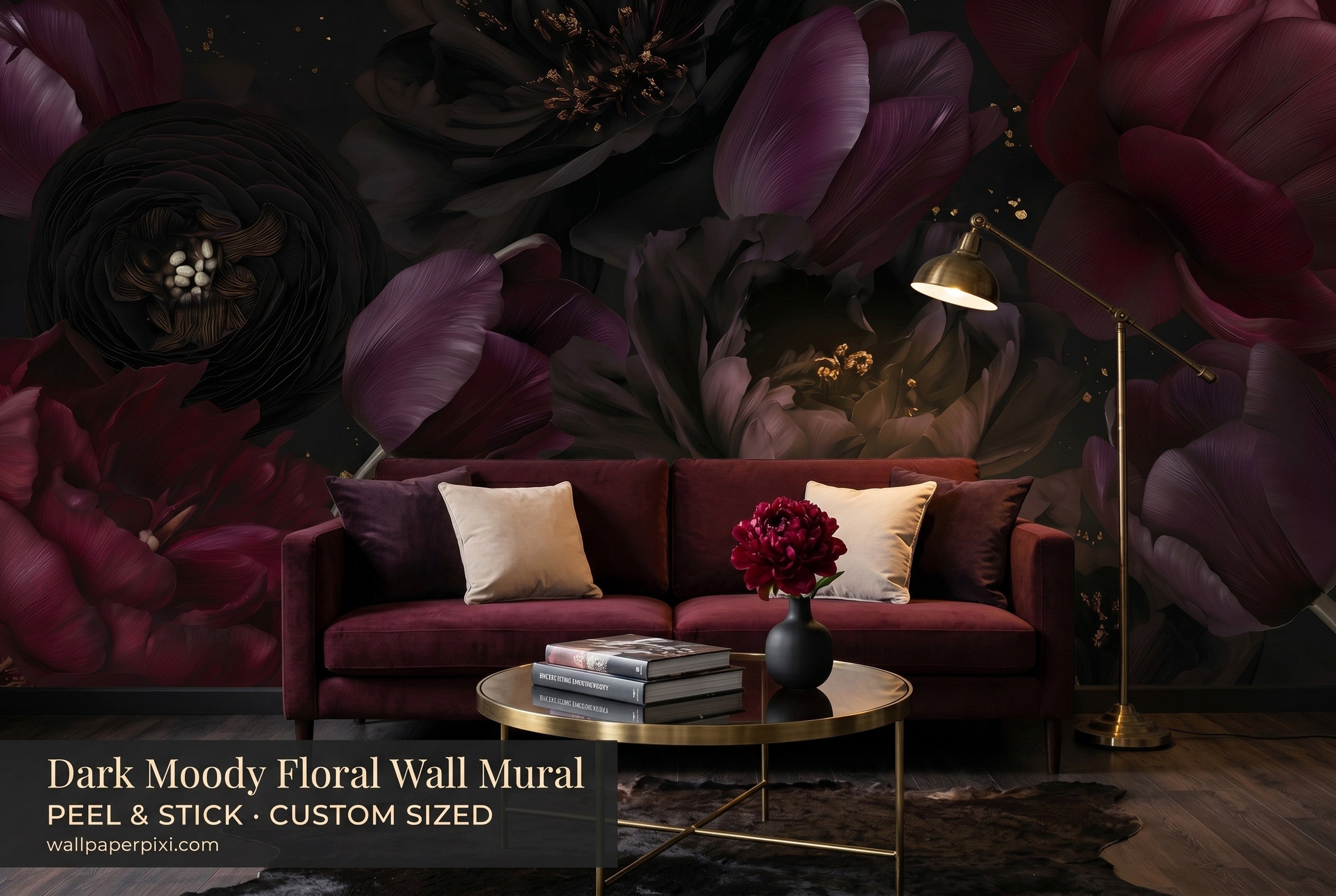 Dark moody floral wall mural in a bright living room behind a deep burgundy velvet sofa with brass accents and warm ambient lighting
