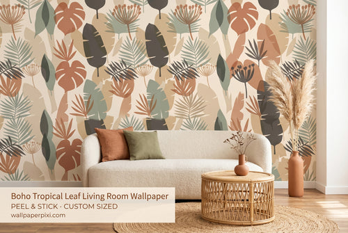 Terracotta sage tropical leaf wallpaper in a bright organic modern living room with a cream bouclé sofa rattan coffee table and dried botanical arrangement