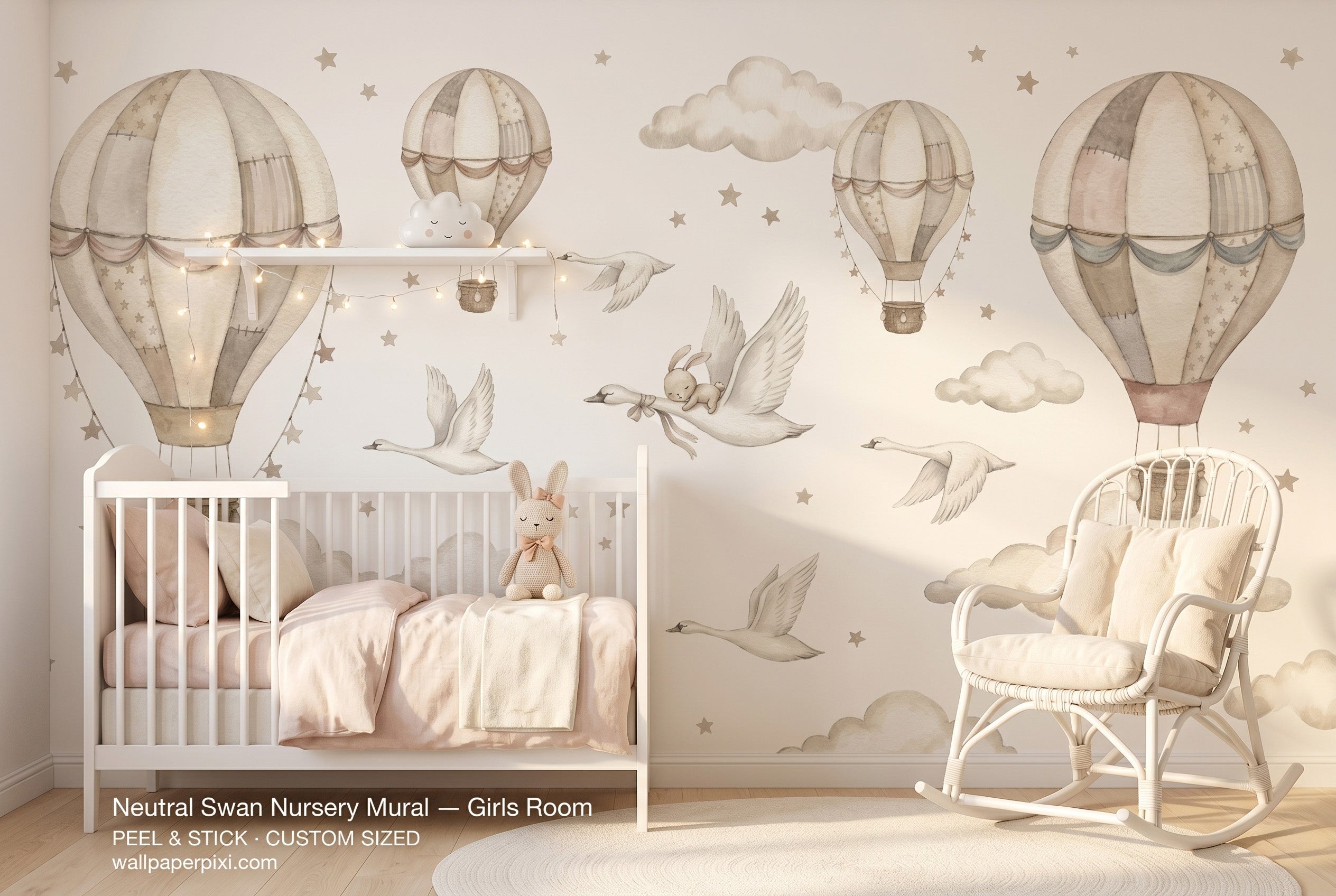 Neutral swan nursery wall mural in a bright girls nursery with a white crib blush bedding a knitted bunny and warm fairy lights