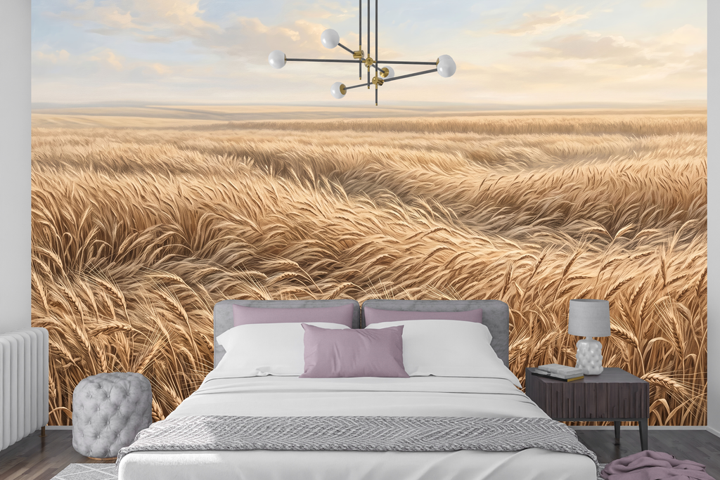Pastoral harvest countryside peel and stick wallpaper behind a cozy vintage bed
