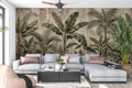 Moody vintage tropical jungle mural in a dramatic living room