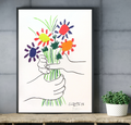 Pablo Picasso The Flowers of Peace canvas print in a bright mid-century modern living room