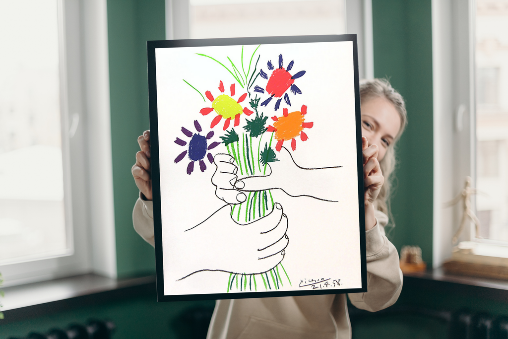 Minimalist line art hands holding flowers displayed above a serene modern bed