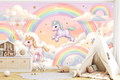 Pastel watercolor unicorn and rainbow wallpaper in a sweet magical nursery