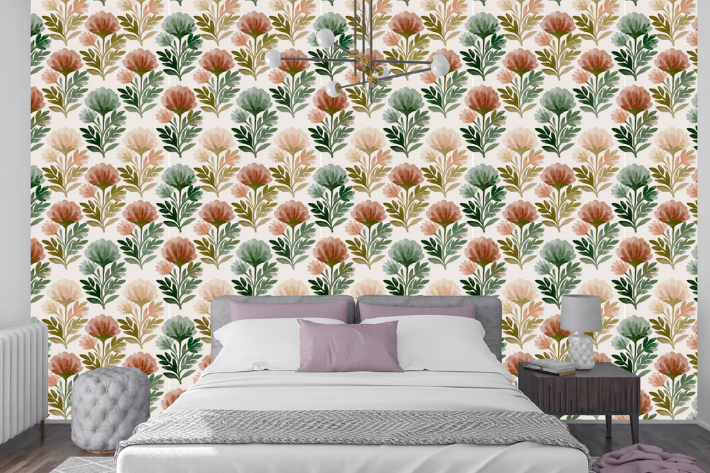 Terracotta and green stamped floral wallpaper creating a warm accent wall in a rustic bedroom