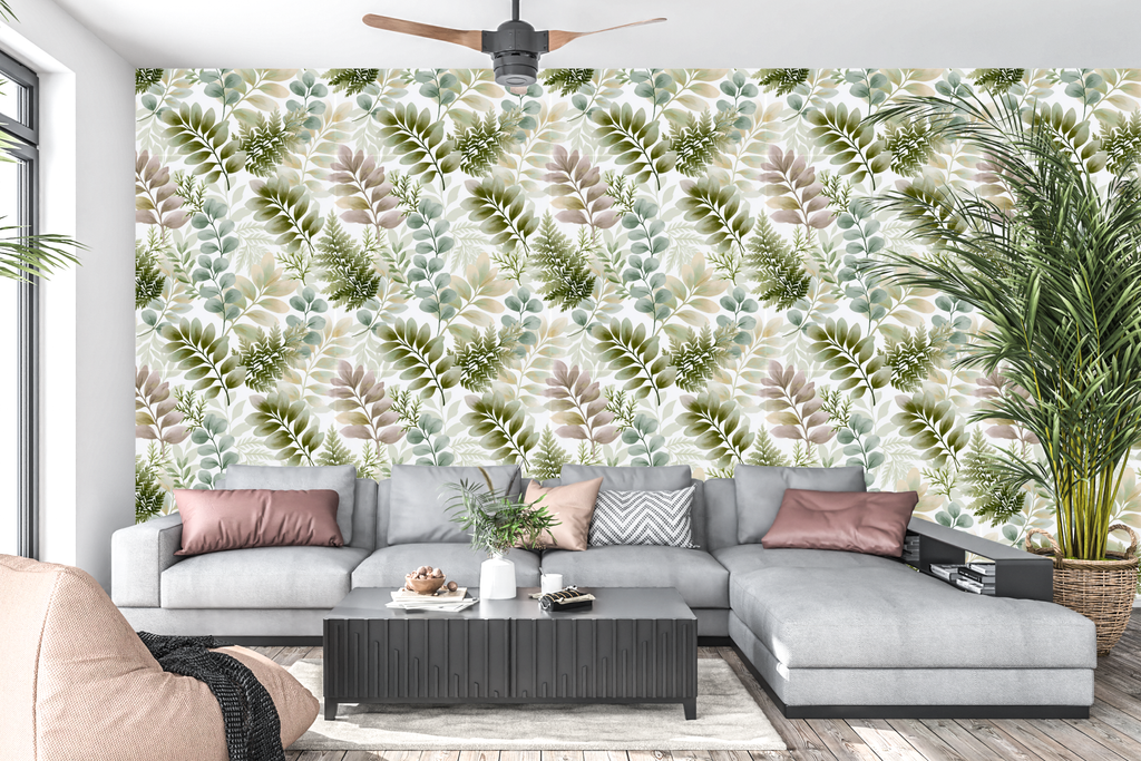 Elegant fern and eucalyptus peel and stick wall mural behind a neutral living room sofa