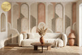 Terracotta arch geometric wall mural in a warm earthy boho living room with Art Deco inspired arches in sand and taupe