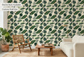 Tropical monstera and palm leaf botanical peel and stick wallpaper in a modern living room