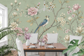 Vintage Chinoiserie bird and peony mural in an elegant traditional dining room