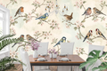 Vintage botanical bird and blossom wallpaper in a charming cheerful kitchen