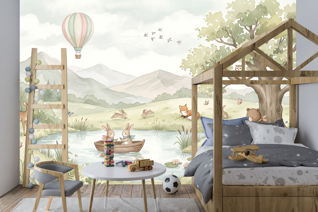Reading bear and grand oak tree peel and stick wallpaper behind a toddler bed
